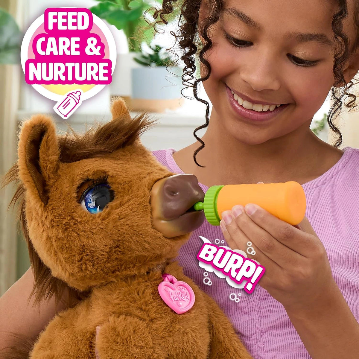 Child feeding FurReal Penny Feed & Prance Pony with the included bottle