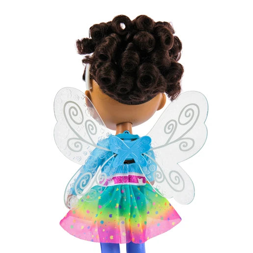 Back view of Gabby's Dollhouse Dandelion Magic Gabby Doll showing curly hair, rainbow skirt and fairy wings