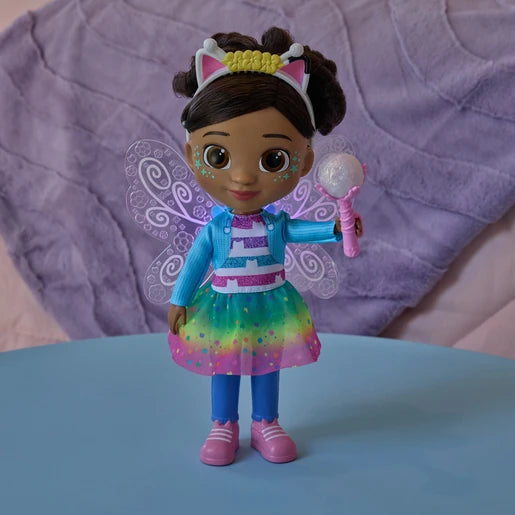 Gabby's Dollhouse Dandelion Magic Gabby Doll holding the wand with fairy wings glowing purple