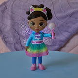 Gabby's Dollhouse Dandelion Magic Gabby Doll holding the wand with fairy wings glowing purple