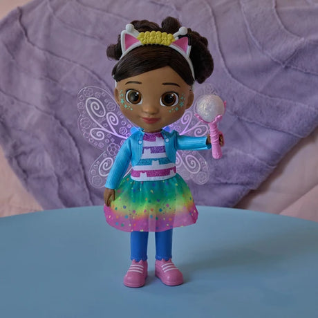 Gabby's Dollhouse Dandelion Magic Gabby Doll holding the wand with fairy wings glowing purple