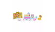 Cakey Cat's Fairy Kitchen pieces arranged separately with two figures, illustrated cupboard backdrop, counter, oven, rolling pin, mixing bowl, baking tray, pink egg box and yellow surprise container