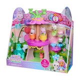 Gabby's Dollhouse Fairylandia Flutter-riffic Tea Party Playset in angled retail packaging, showing the pink flower-shaped tea party stand, colourful teacups, miniature Gabby Cats and fairy garden decorations.