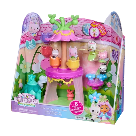 Gabby's Dollhouse Fairylandia Flutter-riffic Tea Party Playset in angled retail packaging, showing the pink flower-shaped tea party stand, colourful teacups, miniature Gabby Cats and fairy garden decorations.
