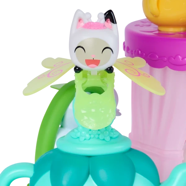 Gabby's Dollhouse Fairylandia tea party playset featuring miniature figures and tea party accessories.