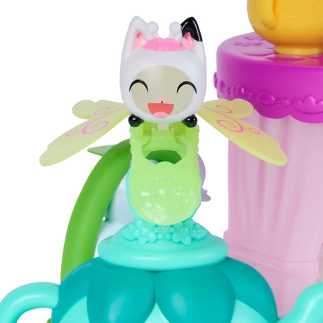 Gabby's Dollhouse Fairylandia tea party playset featuring miniature figures and tea party accessories.