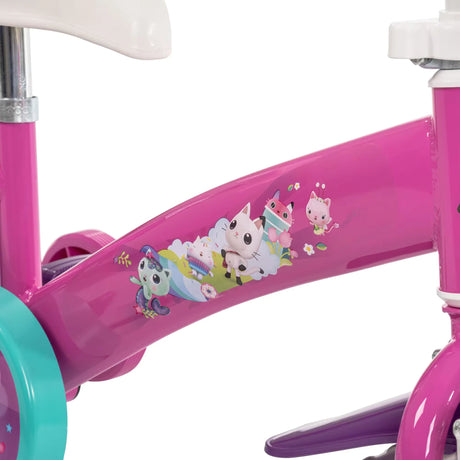 Close up of the Gabby's Dollhouse bike frame with character graphics