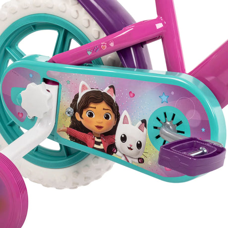 Gabby's Dollhouse 12 inch bike shown from a front angled view with stabilisers