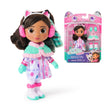 Gabby’s Dollhouse The Movie mini doll wearing cat ear headphones shown beside box packaging