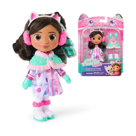 Gabby’s Dollhouse The Movie mini doll wearing cat ear headphones shown beside box packaging
