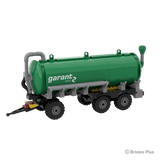 BRIXIES Plus Garant Kotte Slurry Tanker viewed from the drawbar end with the curved pipework, tank front, wheels and chassis visible