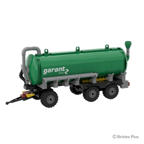 BRIXIES Plus Garant Kotte Slurry Tanker viewed from the drawbar end with the curved pipework, tank front, wheels and chassis visible