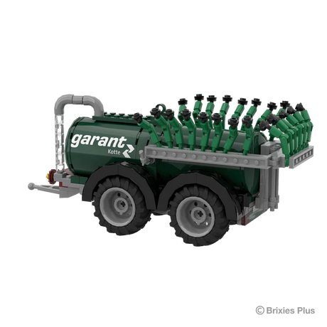 Rear angled view of the BRIXIES Plus Garant Kotte Vacuum Tanker showing the tandem wheels and folded green spreading equipment across the back