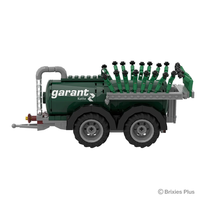 Opposite side profile of the Garant Kotte Vacuum Tanker BRIXIES model with the drawbar, tank body, pipework and tandem wheels visible