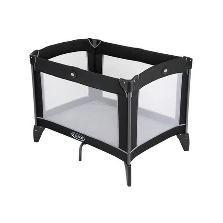 Graco Compact Travel Cot black and grey three quarter view with mesh sides and mattress