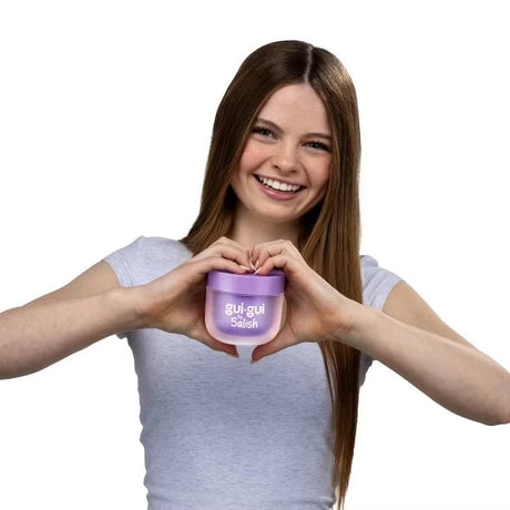 Gui Gui by Salish slime kit purple lidded jar held in a heart shape by Salish Matter