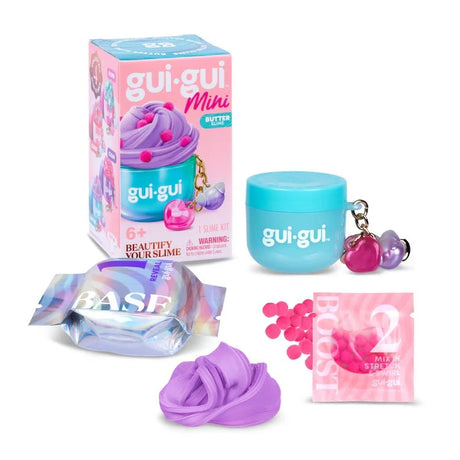 Gui Gui Mini Single kit contents including teal lidded jar with heart charm keyring, iridescent base sachet, purple butter slime, pink beads and booster sachet, shown with box