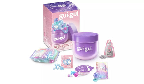 Gui Gui Single Pack purple lidded slime jar shown with all kit contents including base sachet, booster, beads, charms, mini figurine and sparkle sachet