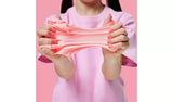 Gui Gui Single Pack pale pink slime pulled apart between two hands showing stretchy butter slime texture