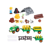 Happy Farm tractor toy with yellow and green trailers, animals, logs and bales arranged for preschool farm play.