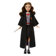 Harry Potter Hermione Granger fashion doll wearing Gryffindor uniform and holding her wand