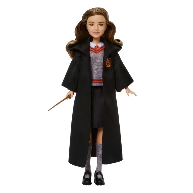 Harry Potter Hermione Granger fashion doll wearing Gryffindor uniform and holding her wand