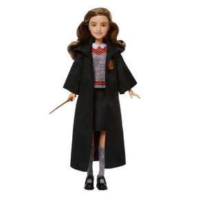 Harry Potter Hermione Granger fashion doll wearing Gryffindor uniform and holding her wand
