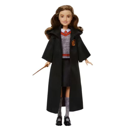 Harry Potter Hermione Granger fashion doll wearing Gryffindor uniform and holding her wand