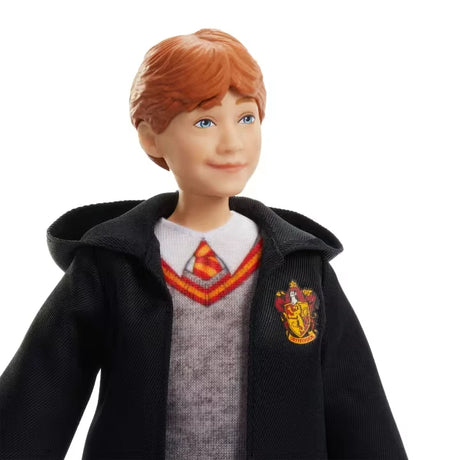 Close view of the Ron Weasley fashion doll with red hair and Gryffindor uniform