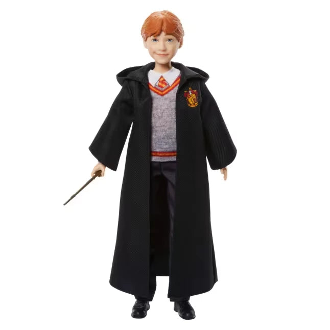 Harry Potter Ron Weasley fashion doll wearing his Gryffindor uniform and holding his wand