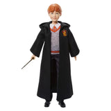 Harry Potter Ron Weasley fashion doll wearing his Gryffindor uniform and holding his wand