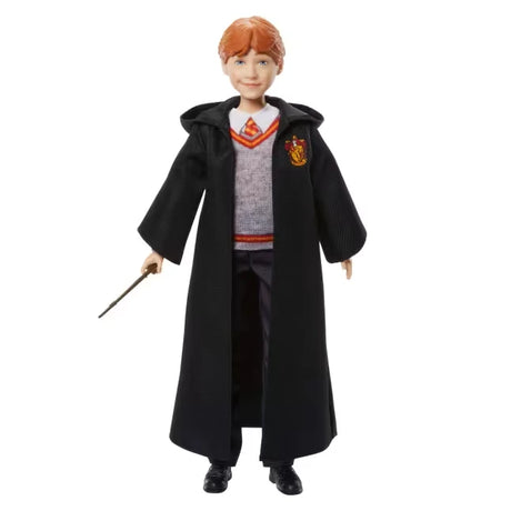 Harry Potter Ron Weasley fashion doll wearing his Gryffindor uniform and holding his wand
