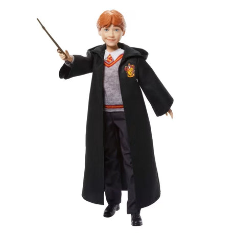 Harry Potter Ron Weasley fashion doll posed with his wand raised