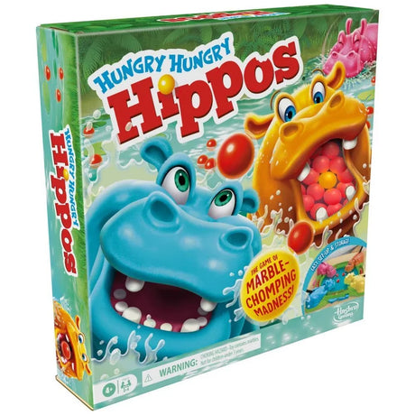 Front of Hasbro Hungry Hungry Hippos board game box with blue and orange hippos – Ireland