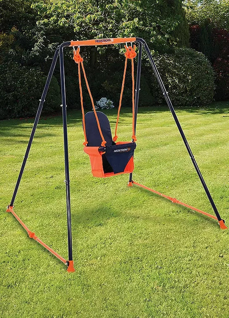 Hedstrom toddler swing set standing on grass