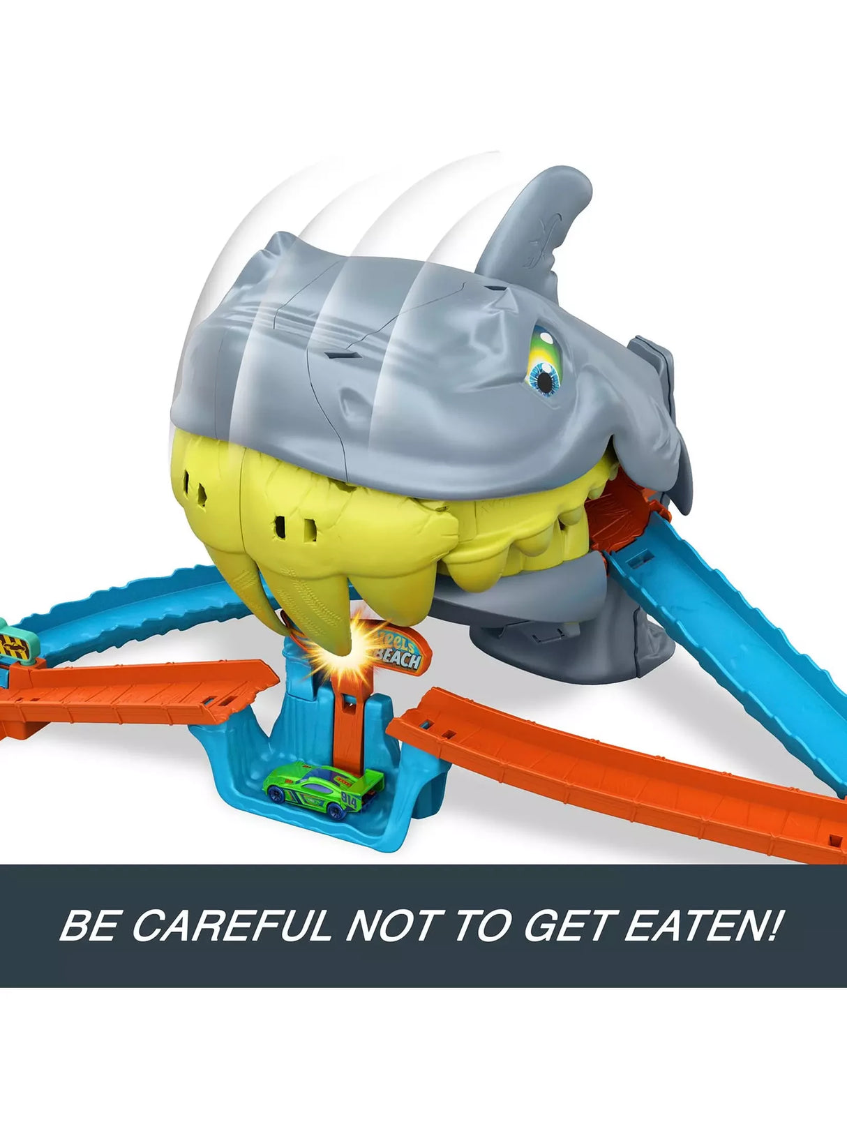 Hot Wheels City Shark Chomp Beach Playset with car positioned under the shark jaws