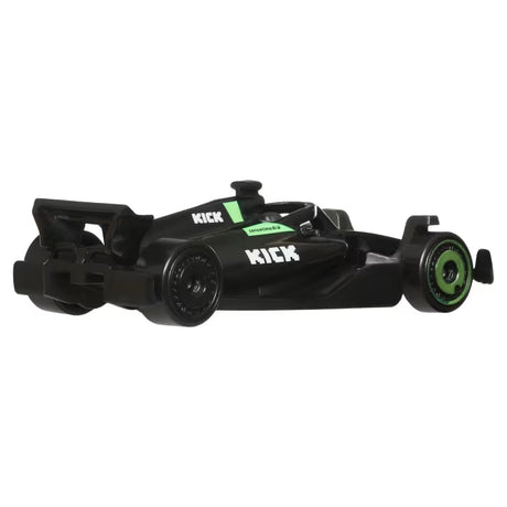 Black and green Hot Wheels Formula 1 car with KICK logos shown from the rear and side. 