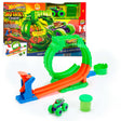 Hot Wheels Monster Trucks Mutant Chaos Loop Challenge box beside the assembled loop track, green and purple monster truck and green slime container.