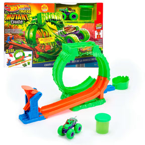 Hot Wheels Monster Trucks Mutant Chaos Loop Challenge box beside the assembled loop track, green and purple monster truck and green slime container.
