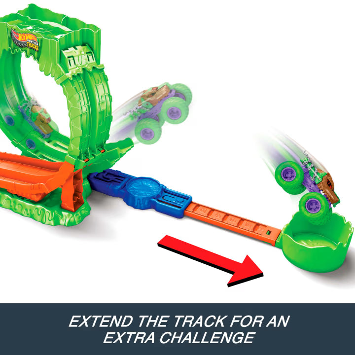 Hot Wheels Monster Trucks Mutant Chaos Loop Challenge with the green and purple monster truck shown at two points along an extended track leading to the green landing cup.