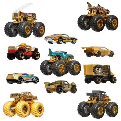 Hot Wheels Monster Trucks Trophy Champions vehicles showing Bigfoot, 5 Alarm, Bone Shaker, Tiger Shark, Mega Wrex and six gold accent cars