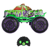 Hot Wheels Mutant Chaos Wreckin' Wolf RC side view with slime and chain graphics beside controller