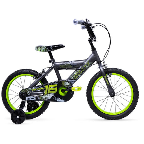 Huffy Delirium grey and green bike side view with green wheel rims, black stabiliser wheel, black saddle and patterned chain guard