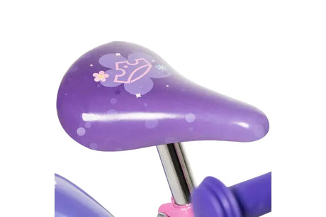 Close up of purple bike saddle with butterfly graphic