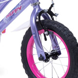 Close up of Huffy So Sweet bike front wheel, pink rim, black tyre, purple fork and front brake