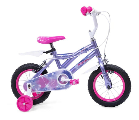 Huffy So Sweet kids bike with purple frame, pink grips, pink saddle, pink wheel rims and pink stabilisers shown from a front angle