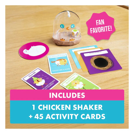 Chicken Butt game contents with cards and shaker laid out on a table Ireland