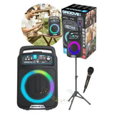 iDance Groove X1 speaker shown with product box, microphone and stand