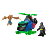 Blue, green and black Batcopter displayed with Batman and winged Man Bat figures