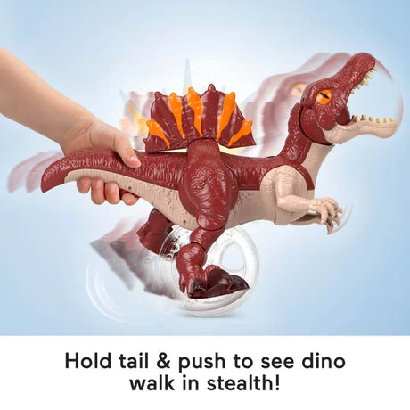 Imaginext Jurassic World Spinosaurus walking forward as the tail control is pushed